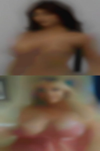 Sucking on her fat breasts and nipples.